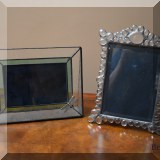D28. 2 Glass picture frames. 